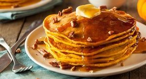 Homemade Pumpkin Pancakes with Butter Pecans and Maple Syrup